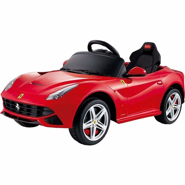 Kids red pedal car designed to be a sporty flashy car that kids will surely enjoy maneuvering inside and outside the house