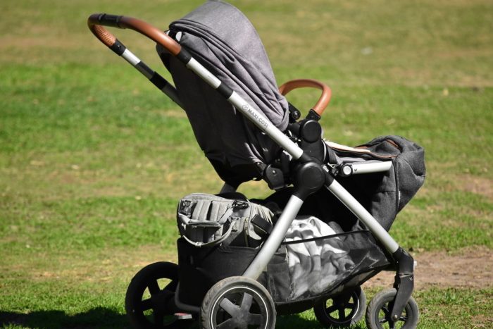 Britax Affinity Stroller is placed on a grassy yard. This affordable Affinity stroller has best features to keep your little kiddo safer. 