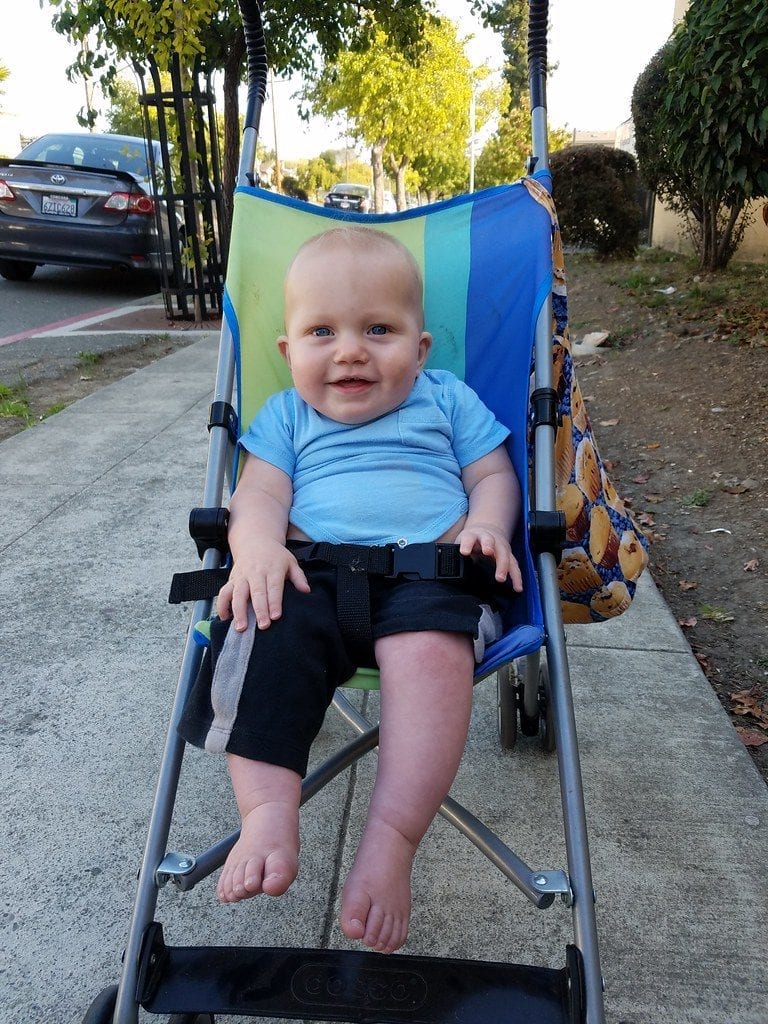 Happy baby on a stroller, this is a nice pram you can also buy for your child