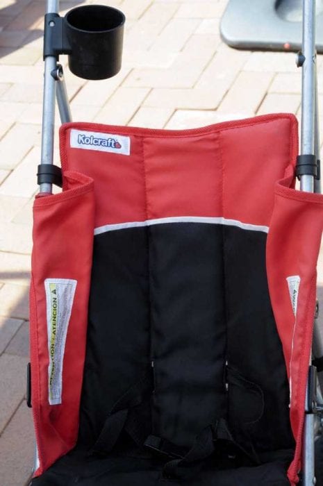 A red and black Kolcraft stroller. Kolcraft Cloud is a Lightweight Stroller and safe for kids.