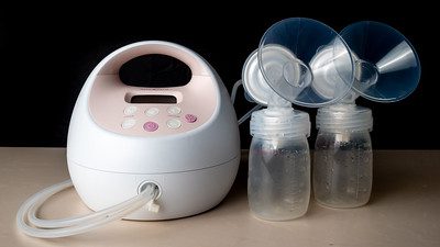 Spectra Baby USA S1Plus breast pumps on top of a clean table.