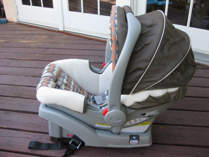 Graco SnugLock 30 infant car seat in grey and orange color