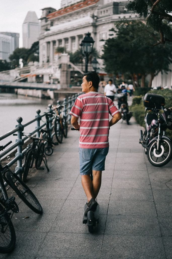 a man casually walking on the street