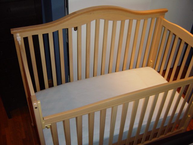 Best baby cribs have bars on each side.