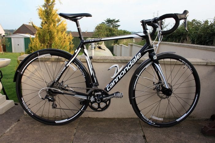 black bicycle with white lettering