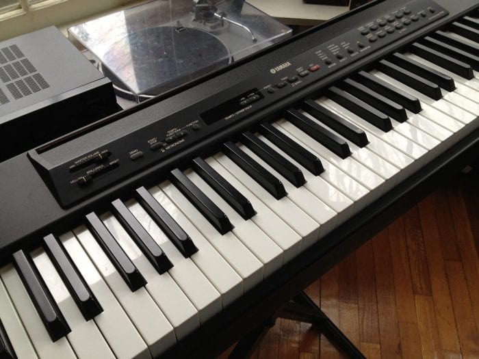 A sleek black piano that ranks best among the best of cost-effective digital piano..