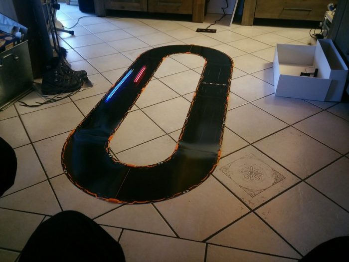 Assemble a race track with your child.