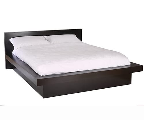 A brown twin mattress, maybe hundred dollars, with a couple of white pillows and a sheet. The best twin mattress.