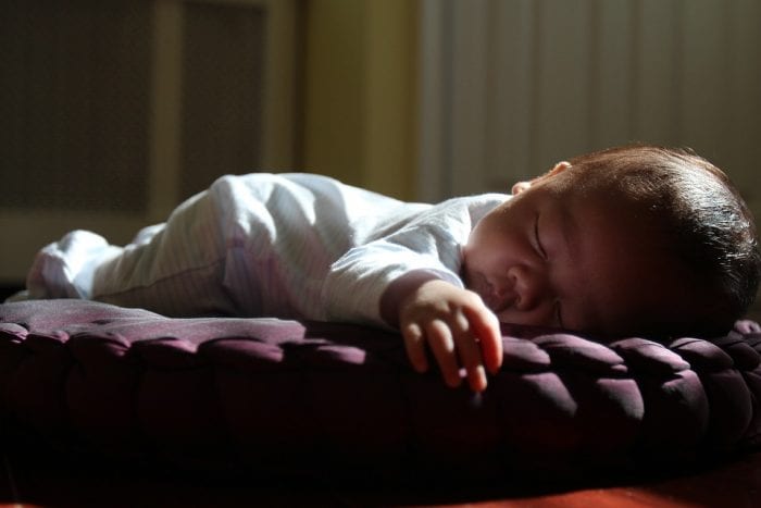 Baby rolls in their sleep: Babies crying. Sleeping baby rolls in sleep. Problem in rolling, crying, laughing could indicate some other problem. Check your child now.