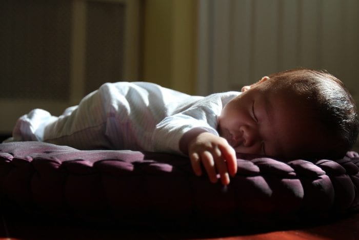 Baby rolls in their sleep: Babies crying. Sleeping baby rolls in sleep. Problem in rolling, crying, laughing could indicate some other problem. Check your child now.