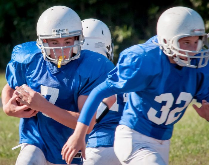 These kids are wearing the best youth football helmet for their safety.