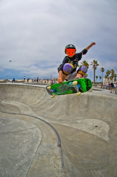 Skateboard - kid playing with a skateboard