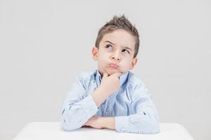 The old boy wearing his best blue boy long-sleeved shirt sits at the table and holds his chin while thinking deeply of the best gifts. Can you guess what he's thinking? Check this out.