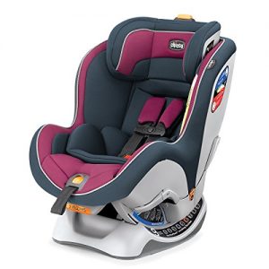 A modern convertible car seat featuring dark and light gray shell with plum accents, equipped with an advanced safety harness and recline system.