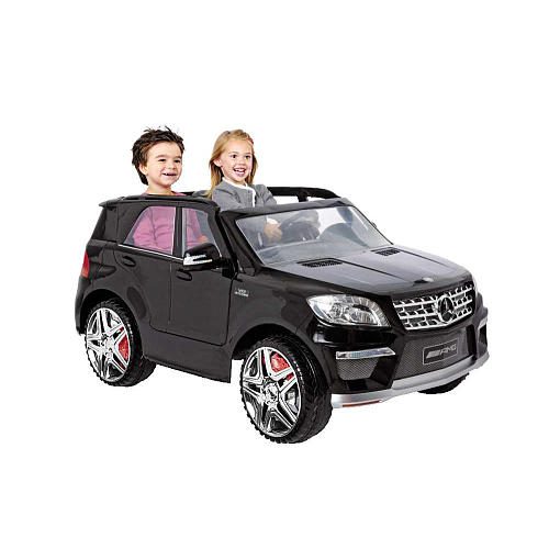 children riding an Avigo Mercedes (but not pink)
