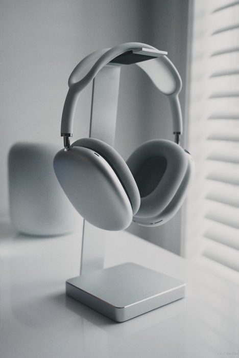 A pair of grey noise cancelling headphones. Look for the best model.