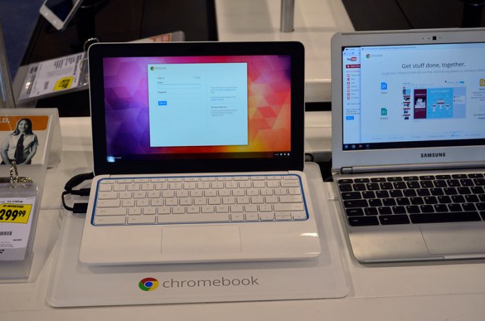 A picture of two PC for children, a white chromebook and a Samsung with black keyboard.