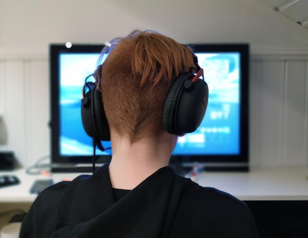 A teenager enjoying his online playing.