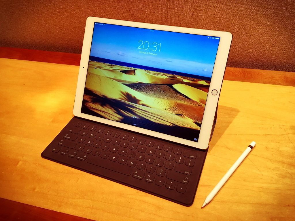 An iPad Pro with Apple Pencil, showcasing the tablet's sleek design, high-resolution display, and seamless interaction