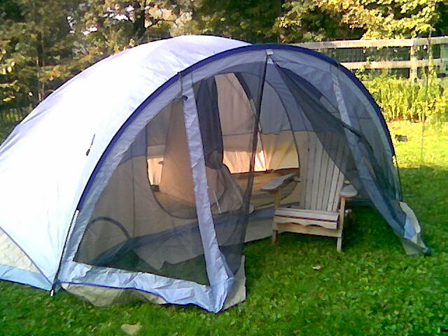 Spacious screen tent perfect for outdoor adventures, featuring excellent ventilation and bug protection.