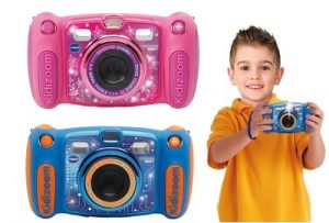 Pink and blue kids camera. A boy is holding the blue camera. 