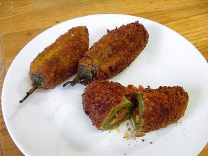 air fryer deep jalapeno poppers: The air fryer jalapeno poppers are cooked before jalapenos' stuffed with cheese. When you cook poppers, jalapeno poppers loses its hotness. If you want to make poppers spicy, then leave jalapenos seeds in while they’re frying. Delicious poppers.