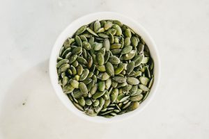 Air frying pumpkin seeds as source of protein.