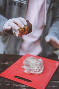 Marinating the air fryer fried chicken to have its flavor.