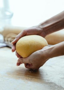 Preparing banana bread dough at home.