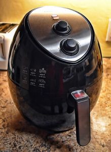 A black air fryer. An air fryer has the wonderful functions when it comes to our kitchen. It can help us with our food like mushrooms and gives the wonderful convenience when we are too busy. You can check the different ways to use this appliance and get to know the other functions it has. 