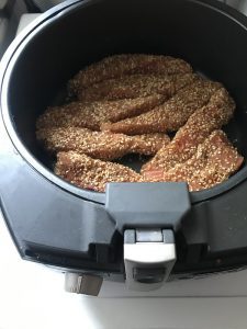 It shows the result of the salmon placed in an air fryer. 