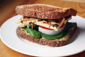  Snacks with a hint of spice and tang, served with cabbage and spicy mayonnaise on a bun.