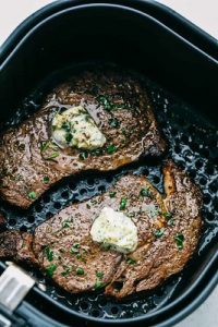 Air fryer strip steak is undeniably mouth-watering! Indulge yourself with every bite of strip steaks cooked in an air fryer. Take some bite of juicy air fryer strip steaks!