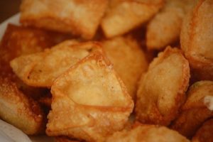 Air fry your wontons until the wontons are golden brown.