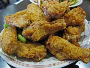 Delicious and healthy air fryer salt & vinegar wings meal elegantly served on the table. This chicken wings are freshly prepared from the air fryer.