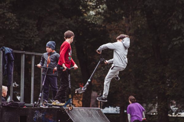 A boy tried to do a trick in his two-wheelers