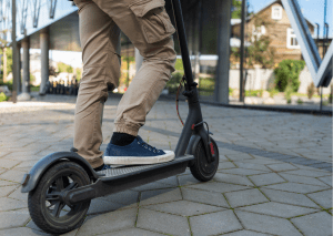 Man riding an electric scooter 