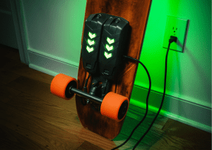 Charging electric skateboard