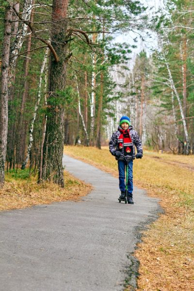 A child on a scooter