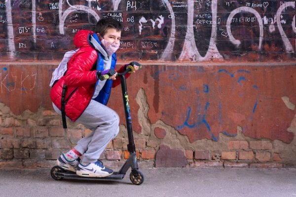 Boy on a scooter