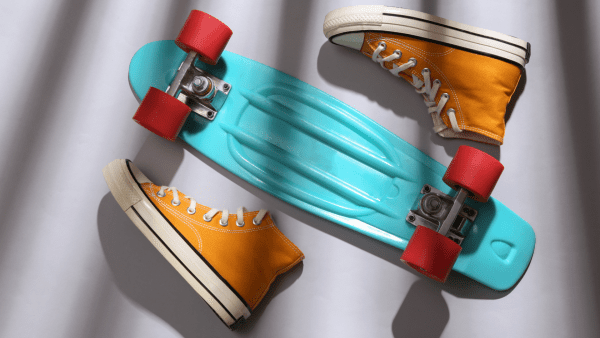 one of the best blue penny boards and a pair of orange shoes. 