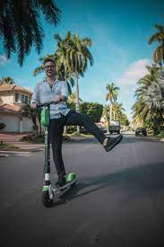 A man enjoying his scooter ride