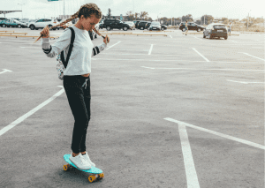 Skateboarding for preteens - A skater girl in her preteens riding her skateboard for preteens