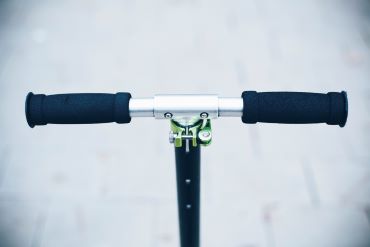 Handlebars of an electric scooter properly installed.