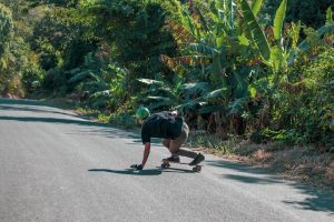 Skateboarding drop down tricks