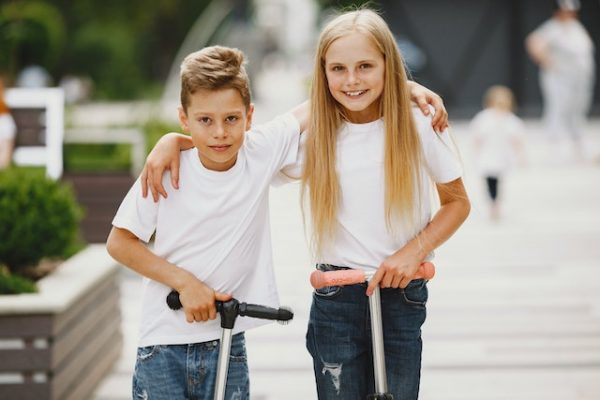 Kids on scooters.