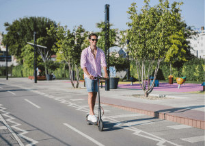 Riding a scooter in a hot sunny day