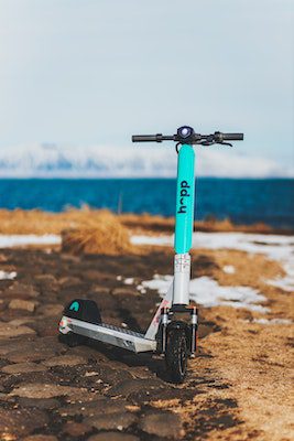 teal model in sandy terrain by seaside