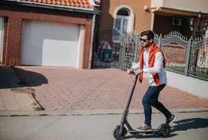 here's a person taking an amazing ride uphill: Depending on the slope's steepness, riders may need in adjusting their speed and apply more pressure on the handlebars in keeping it stable. Uphill riding can be a great workout for leg muscles and cardiovascular health, but it's essential in staying cautious and aware of the surroundings, especially when sharing the road with other vehicles or pedestrians.