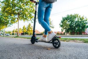 An image of a scooter, which is a compact and two-wheeled motorized vehicle, often used for short-distance commuting. It offers an efficient and eco-friendly mode of transportation for urban mobility.